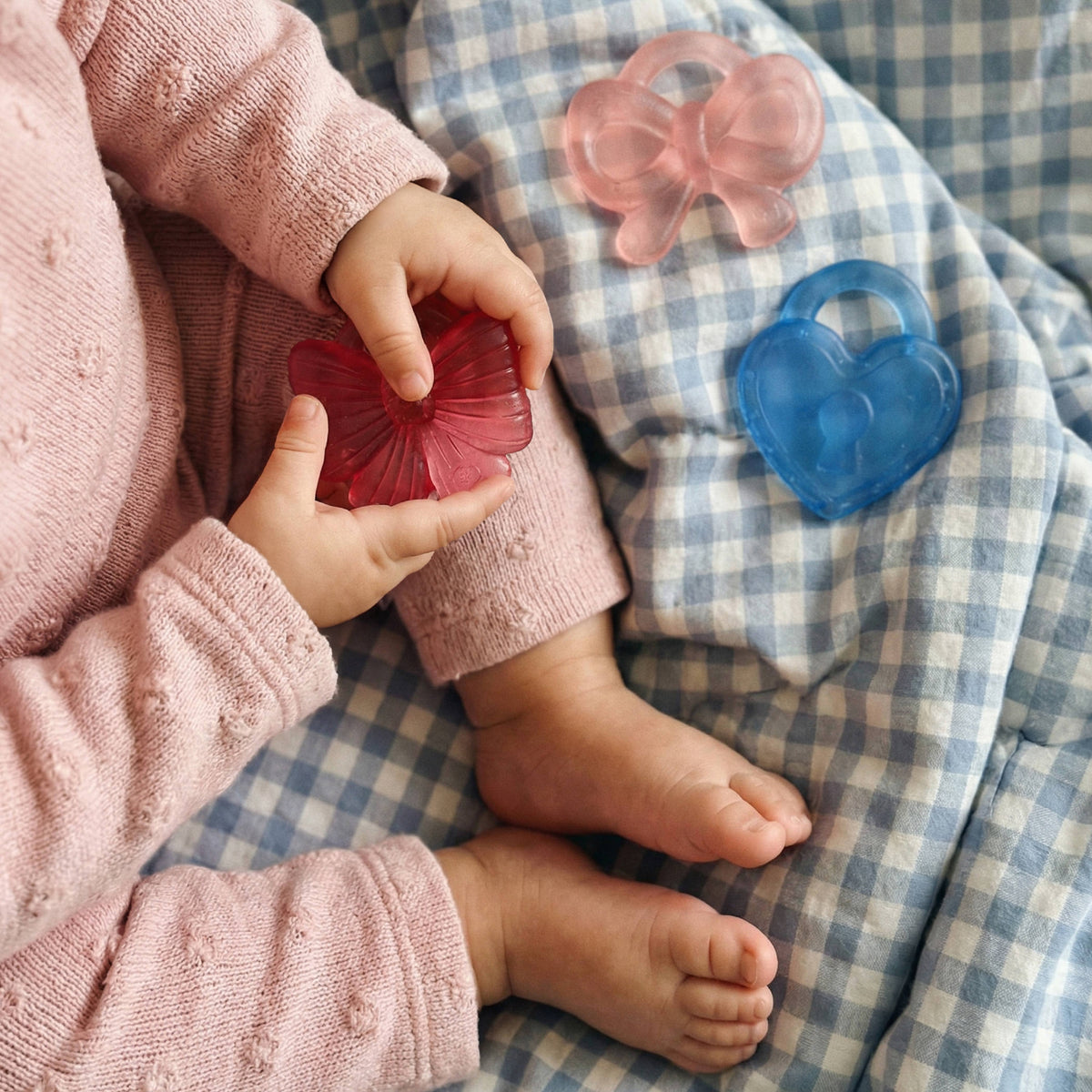 Itzy Ritzy Bow silicone cooling girly teether Cutie Coolers™ Bow - Little Birdies Boutique children's store