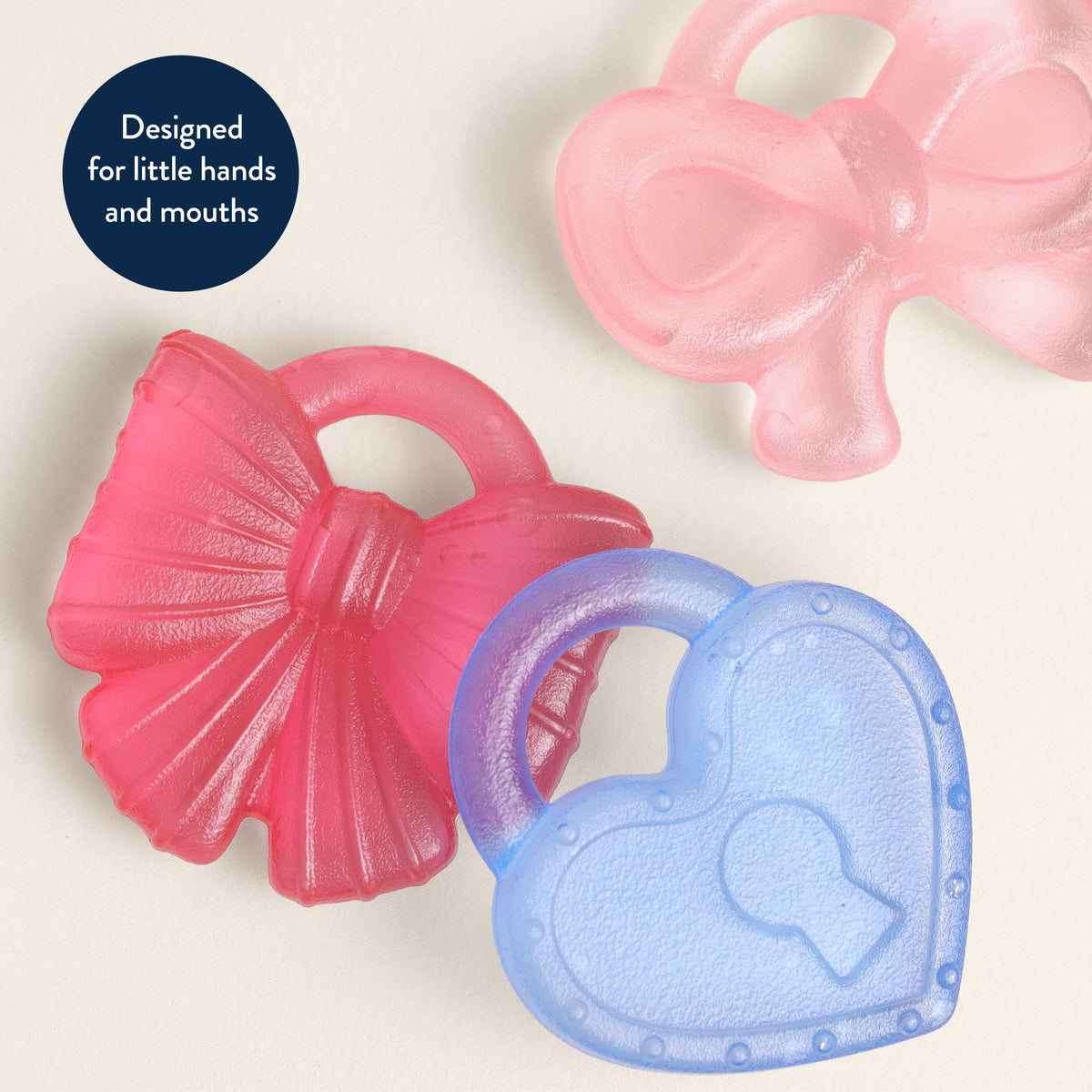 Itzy Ritzy Bow silicone cooling girly teether Cutie Coolers™ Bow - Little Birdies Boutique children's store