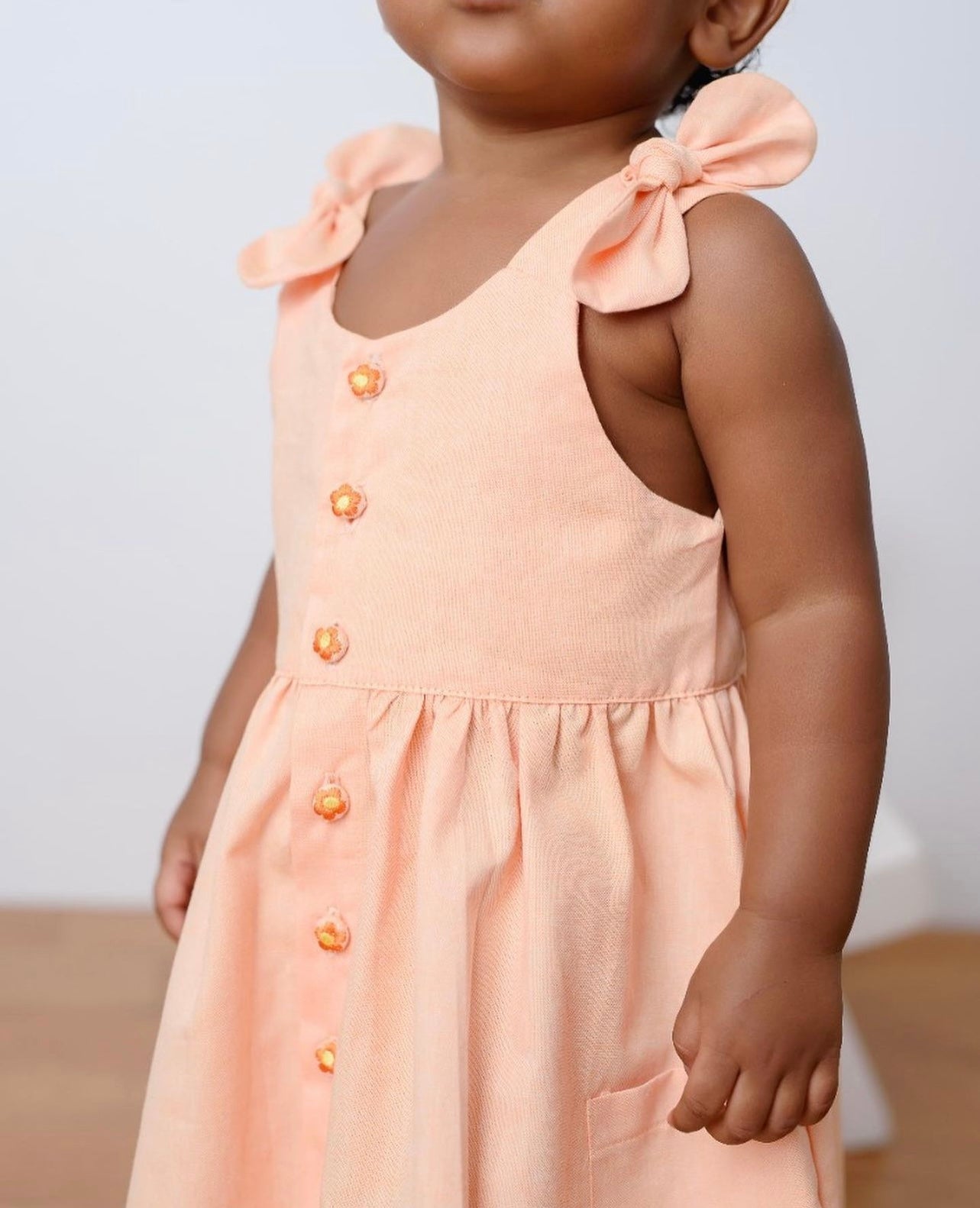 Kafka Baby Peach Sherbet Button Front Dress - Little Birdies